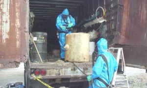 Spill responders decommissioning a make-shift drug lab. 